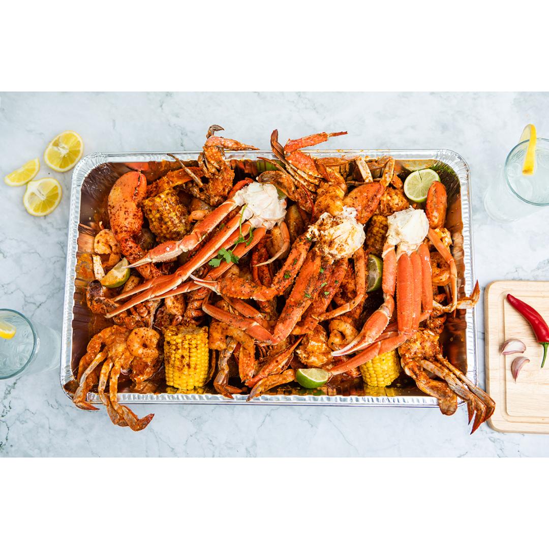 A Flavourful Journey: The History of the Seafood Boil and its Rise in Popularity in the UK